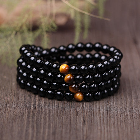 Bracelet mala onyx noir avec œil de tigre - l'atelier d'eos