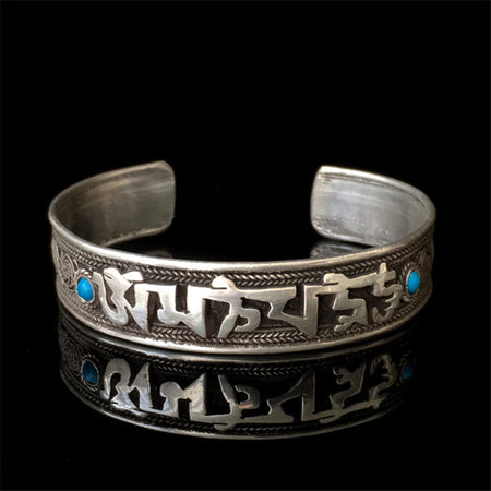 Bracelet tibétain au mantra Om Mani Padme Hum en argent et cuivre - l'atelier d'eos